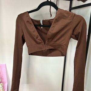 Brown long sleeve crop top . Size M